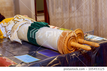 Torah is on table in synagogue and is ready to be read on Shabbat 105453125