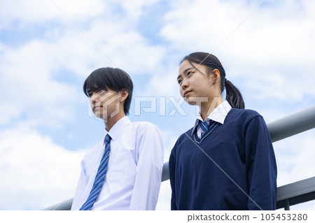 High school boy and girl calling out loud High school boy and girl calling out loud 105453280