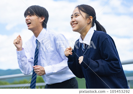 High school boy and girl calling out loud 105453292