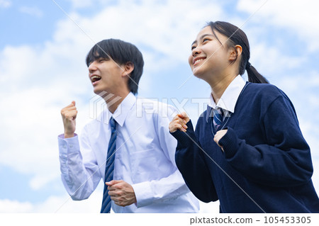 High school boy and girl calling out loud High school boy and girl calling out loud 105453305