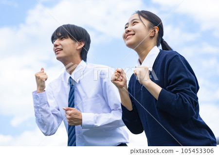 High school boy and girl calling out loud High school boy and girl calling out loud 105453306