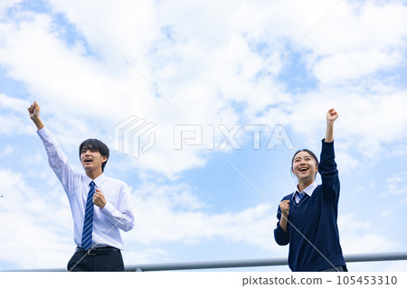 High school boy and girl calling out loud 105453310