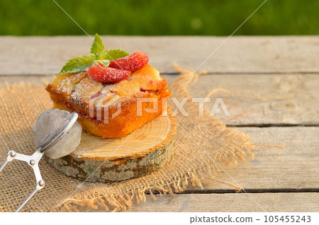 Delicious summer dessert strawberry pie, sweet delicious festive cake with strawberries on a round stand 105455243