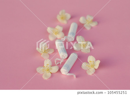 Women's and gynecological health care. Menstrual cycle. Hygiene care during critical days. Tampon woman Clean and safe Menstruation, means of protection. Women's and gynecological health care. Menstrual cycle. Hygiene care during critical days. Tampon woman Clean and safe Menstruation, means of protection. 105455251