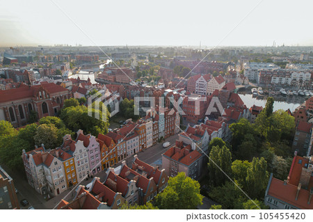 Beautiful panoramic architecture of old town in Gdansk, Poland at sunrise. Aerial view drone pov. Landscape cityscape City from Above. Small vintage historical buildings Europe Tourist Attractions 105455420