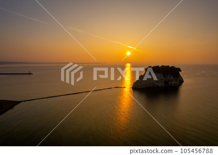 Drone | Aerial photograph of Oku-Noto's sightseeing spot Mitsukejima (also known as Gunkanjima) and sunrise in a refreshing morning | Suzu City, Ishikawa Prefecture 105456788