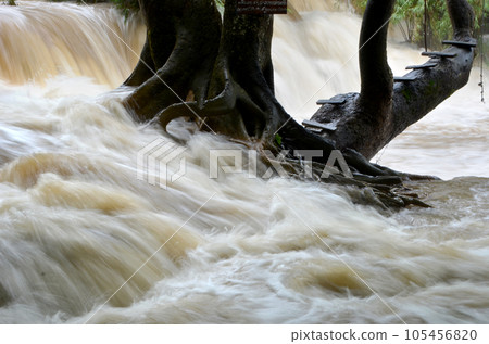 Kuang Si Waterfall flooded by heavy rain Kuang Si Waterfall flooded by heavy rain 105456820