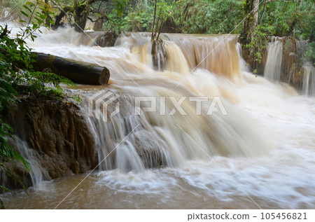 Kuang Si Waterfall flooded by heavy rain Kuang Si Waterfall flooded by heavy rain 105456821