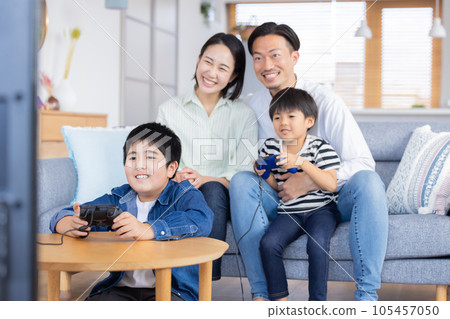 Family portrait Family enjoying video games 105457050