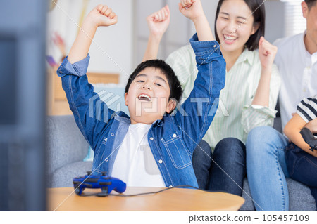 Family portrait Family enjoying video games 105457109