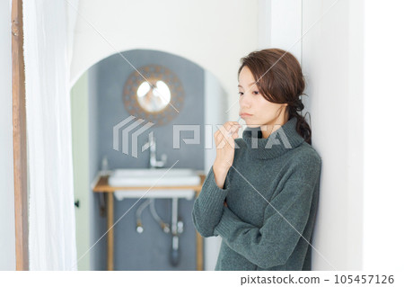 Photo of a woman brushing her teeth 105457126