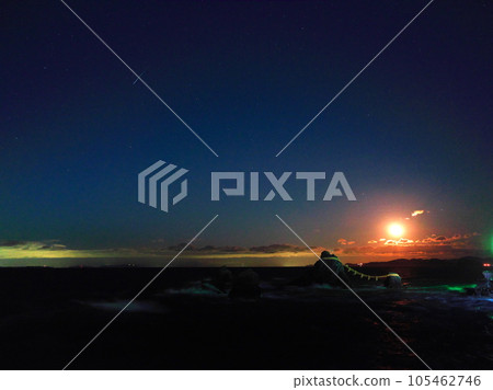 Meoto-iwa rocks and shooting stars at night under the moonlight Meoto-iwa rocks and shooting stars at night under the moonlight 105462746