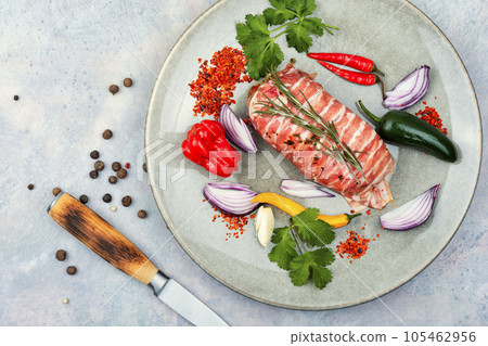 Raw chicken rolls. 105462956