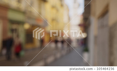 Defocused background of Old city of Nice with vibrant walls and narrow streets Defocused background of Old city of Nice with vibrant walls and narrow streets 105464156