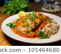 Spanish dish of rice and chicken stew with cod flageolet. 105464680