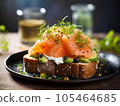 smoked salmon toast with egg and avocado. 105464685