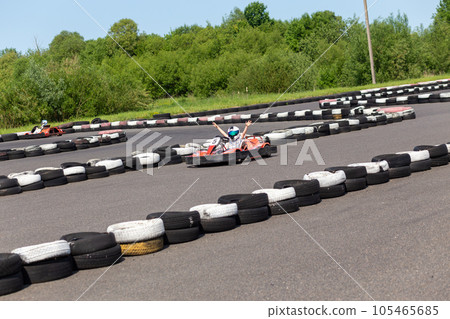 Youth Go Kart Racer on track. 105465685