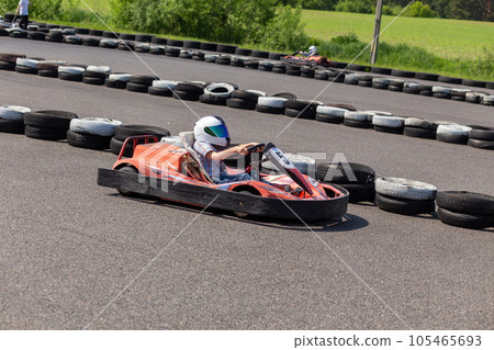 Youth Go Kart Racer on track. Youth Go Kart Racer on track. 105465693