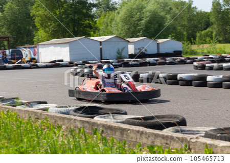Youth Go Kart Racer on track. Youth Go Kart Racer on track. 105465713