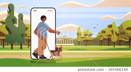 guy owner with cute dog using walking app on smartphone best friends domestic animal friendship concept landscape background guy owner with cute dog using walking app on smartphone best friends domestic animal friendship concept landscape background 105466194