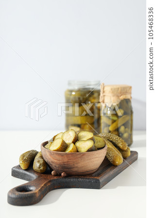 Tasty canned food concept, canned cucumbers, food for winter Tasty canned food concept, canned cucumbers, food for winter 105468336