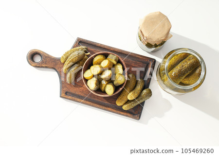 Tasty canned food concept, canned cucumbers, food for winter Tasty canned food concept, canned cucumbers, food for winter 105469260