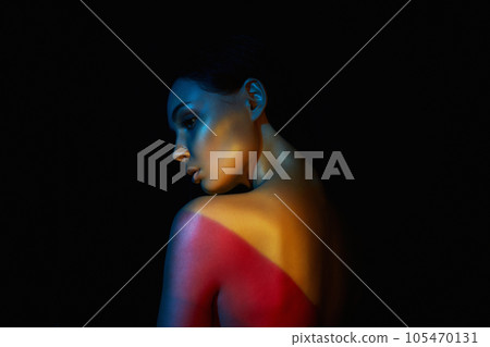 beautiful woman in color lights. Female Back beautiful woman in color lights. Female Back 105470131