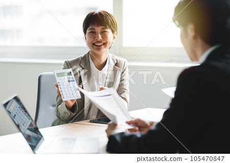 Young business people having business talks Young business people having business talks 105470847