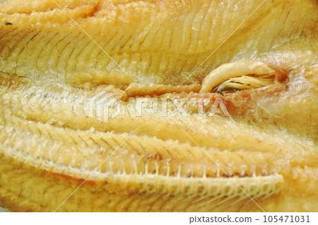 deep fried striped snake head fish with salt on plate 105471031