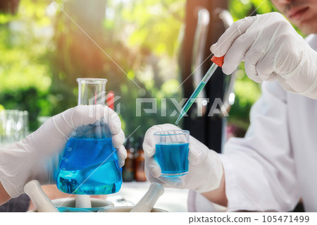Team of researcher or scientists working in laboratory. Researcher or scientists working in laboratory. Researchers are inventing vaccines to treat COVID-19 virus. Team of researcher or scientists working in laboratory. Researcher or scientists working in laboratory. Researchers are inventing vaccines to treat COVID-19 virus. 105471499