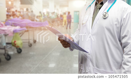 Doctor in gown uniform with patient chart standing on patient screening point OPD background. 105471505