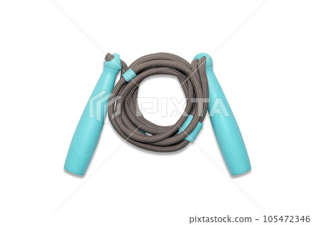 Sports jump rope isolated on white background. A gray children's jump rope with blue handles isolated on a white background. 105472346