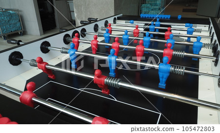 Football table or soccer table game with plastic player figurine. Mini Soccer game which famous in past and be collectable item for foosball lover. Play by two hand control each row of player figurine Football table or soccer table game with plastic player figurine. Mini Soccer game which famous in past and be collectable item for foosball lover. Play by two hand control each row of player figurine 105472803