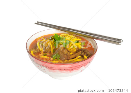 Khao soi - Traditional northern Thai Food, Curry with a noodle with chicken. Khao soi - Traditional northern Thai Food, Curry with a noodle with chicken. 105473244