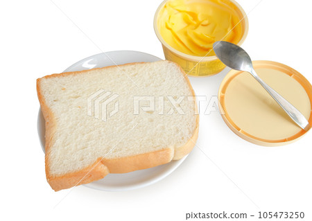 Toasted bread and butter on white background. Toasted bread and butter on white background. 105473250