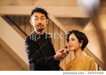 male makeup artist male makeup artist 105473504