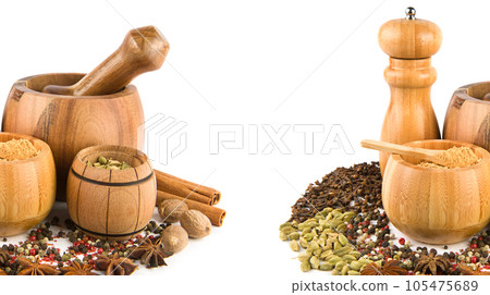 Mortar with pestle, hand mill and spices set isolated on white . Free space for text. Wide photo. Collage. Mortar with pestle, hand mill and spices set isolated on white . Free space for text. Wide photo. Collage. 105475689
