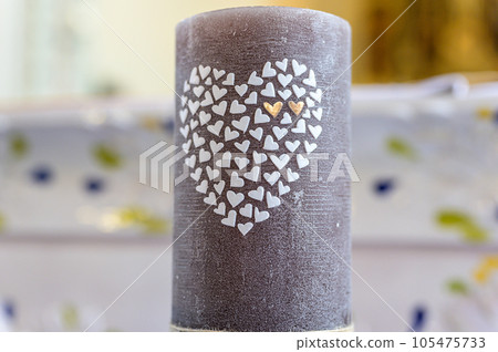The wedding candle for the bride and groom. candle is the family hearth symbol at a wedding 105475733