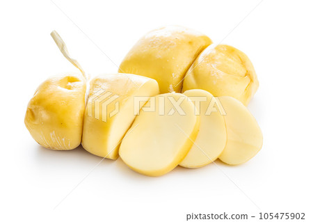 Smoked scamorza cheese isolated on white background. 105475902