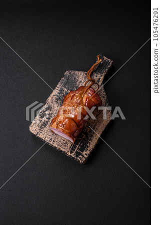 Delicious smoked bacon with salt, spices and herbs 105476291