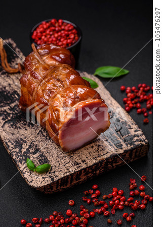 Delicious smoked bacon with salt, spices and herbs 105476297