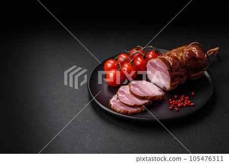 Delicious smoked bacon with salt, spices and herbs 105476311