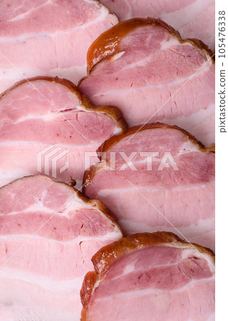 Delicious smoked bacon with salt, spices and herbs 105476338