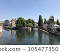 Canal and cityscape 105477350
