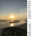 rising sun and low tide sea 105477355