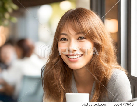 Young woman talking in a cafe Young woman talking in a cafe 105477646