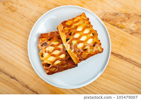 Image of fresh puff cakes with goat cheese at plate 105479007