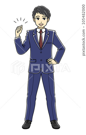 A young man in a suit doing a guts pose while putting his hand on his waist 105482000
