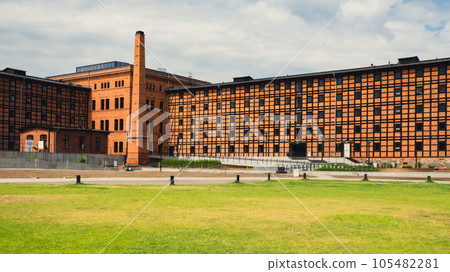 Former Rother Mills building complex made of characteristic brick and a half-timbered structure situated on the Mill Island Old town Bydgoszcz, Poland. Facade of the complex of ancient mills.  105482281