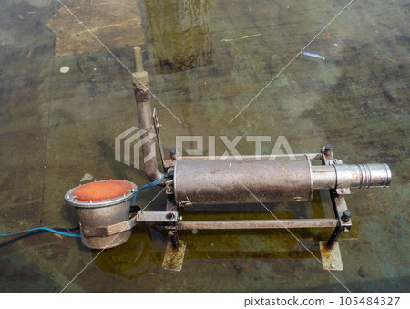 Fountain mechanism. Empty fountain in the park for cleaning. Drained dancing fountain. Technology 105484327
